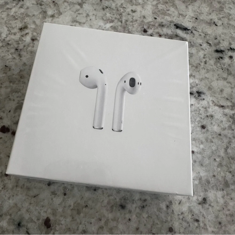 Apple AirPods w/ Wireless Charging Case